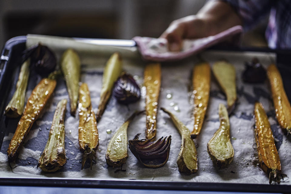 Parsnips on a roasting pan