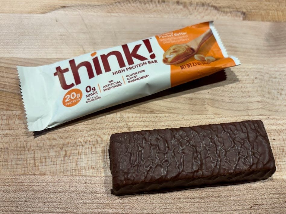 Think! protein bar with unwrapped bar next to it 