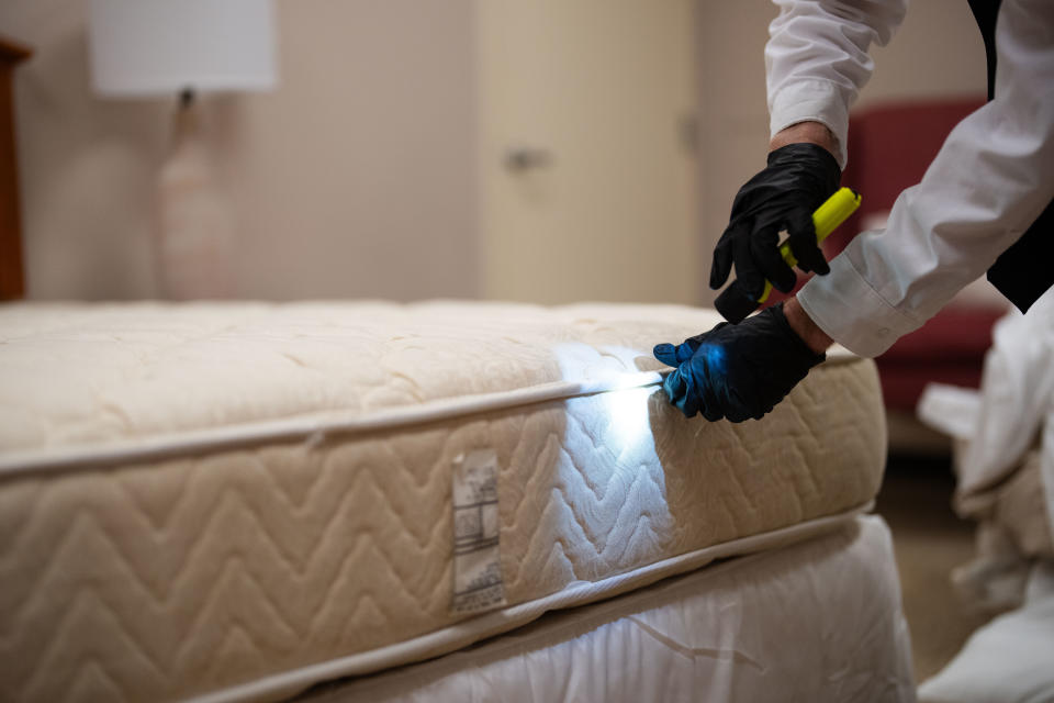 ATLANTA, GA - JULY 19:  Ben Hottel, a technical services manager with Orkin, talks through how he would inspect a hotel room for bed bugs at a mock hotel room at the Orkin Training Center in Atlanta on Wednesday, July 19, 2023. (Photo by Kevin D. Liles for The Washington Post via Getty Images)