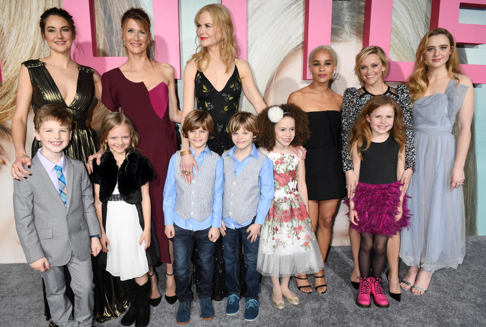 The five costars with their "children"