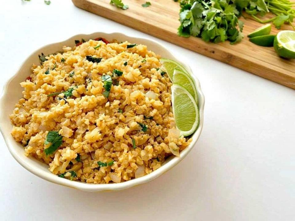 <p>Stylish Cravings</p><p>Tasty enough to eat on its own or with your favorite keto-friendly taco meat!</p><p><strong>Get the recipe: </strong><a href="https://stylishcravings.com/keto-mexican-cauliflower-rice/" rel="nofollow noopener" target="_blank" data-ylk="slk:Keto Mexican Cauliflower Rice;elm:context_link;itc:0;sec:content-canvas" class="link "><strong>Keto Mexican Cauliflower Rice</strong></a></p>