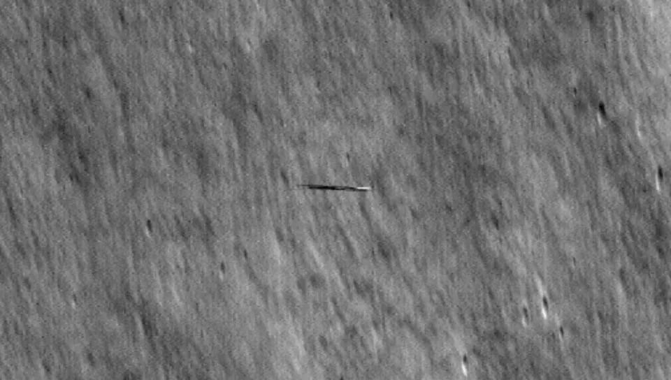 At the first imaging opportunity, LRO was oriented down 43 degrees from its typical position of looking down at the lunar surface to capture Danuri (streaked across the middle) from 3 miles, or 5 kilometers, above it. / Credit: NASA/Goddard/Arizona State University