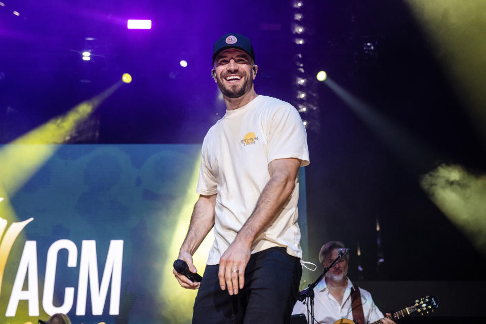 FILE - Sam Hunt performs at the 2021 ACM Party for a Cause at Ascend Amphitheater in Nashville, Tenn., on Aug. 24, 2021. Hunt will headline the Country Bay Music Festival scheduled for Nov. 11-12 at the historic Miami Marine Stadium in Biscayne Bay, Fla. (Photo by Amy Harris/Invision/AP, File)