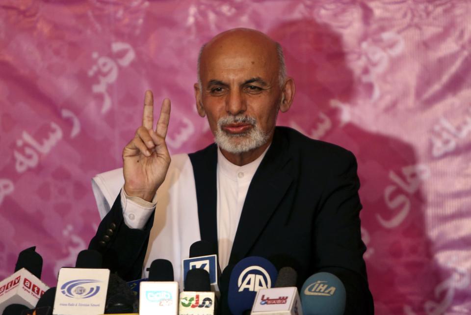 Afghan presidential candidate Ashraf Ghani Ahmadzai speaks during a press conference, in Kabul, Afghanistan, Sunday, April 13, 2014. Two clear front-runners emerged in Afghanistan's presidential election Sunday as partial results showed a tight race between President Hamid Karzai's closest rival in the last vote and a former World Bank official. With 10 percent of the ballots counted, Abdullah Abdullah, who came in second in the disputed 2009 election, had 41.9 percent, followed by Ashraf Ghani Ahmadzai with 37.6 percent. (AP Photo/Rahmat Gul)