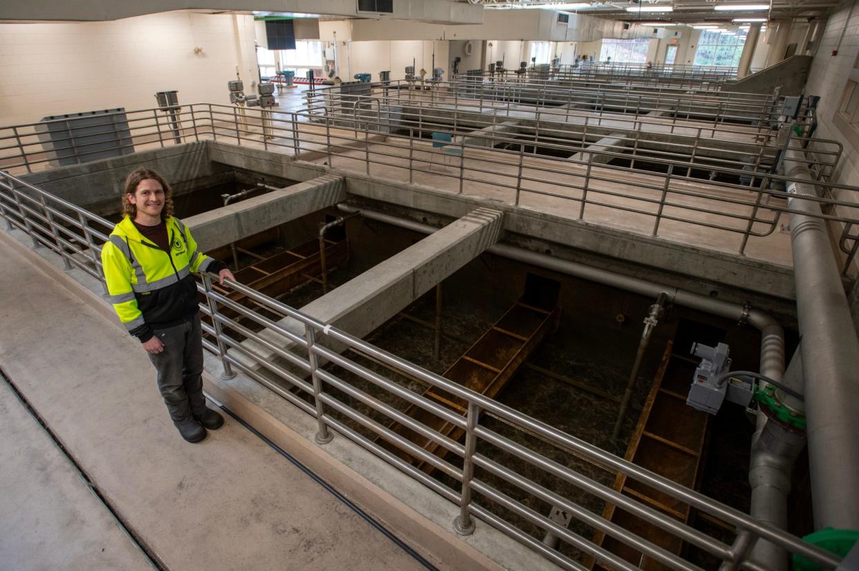 Plant operator Forrest Iwanik stands beside one of eight filters inside the Robert L. Moylan Jr. Water Filtration Plant Friday. The plant produces, on average, 22 million gallons of clean water daily.