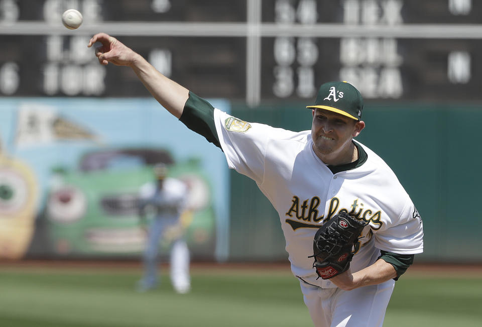 Oakland Athletics pitcher Trevor Cahill throws against the New York Yankees during the first inning of a baseball game in Oakland, Calif., Monday, Sept. 3, 2018. (AP Photo/Jeff Chiu)