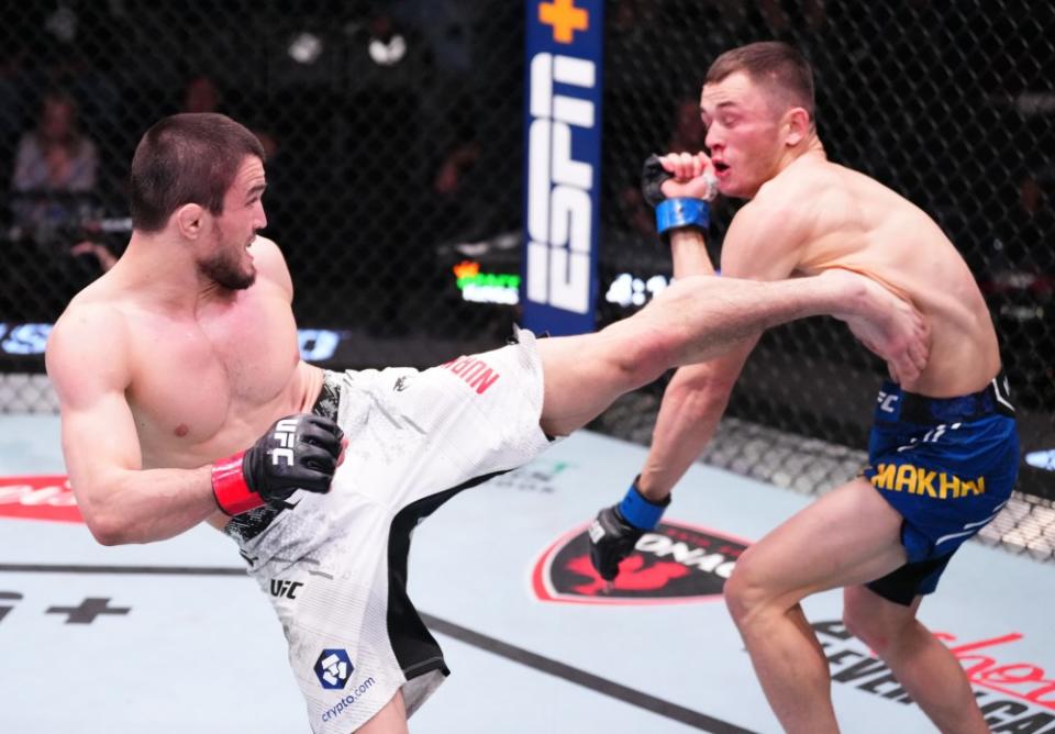 LAS VEGAS, NEVADA – MARCH 02: (L-R) Umar Nurmagomedov of Russia kicks Bekzat Almakhan of Kazakhstan in a bantamweight bout during the UFC Fight Night event at UFC APEX on March 02, 2024 in Las Vegas, Nevada. (Photo by Jeff Bottari/Zuffa LLC via Getty Images)