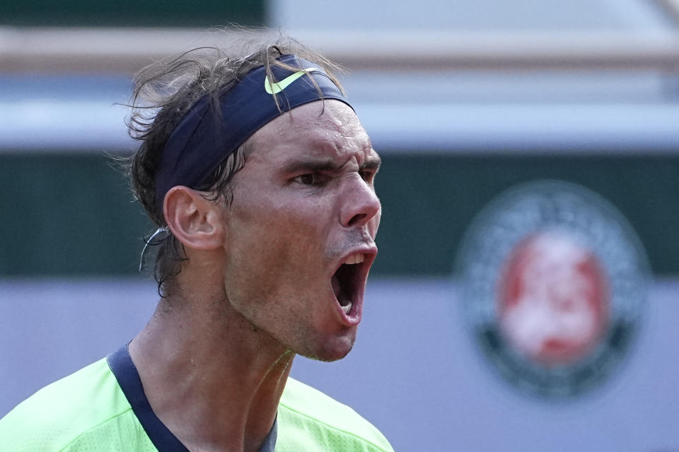 Spain's Rafael Nadal shouts as he plays Argentina's Diego Schwartzman during their quarterfinal match of the French Open tennis tournament at the Roland Garros stadium Wednesday, June 9, 2021 in Paris. (AP Photo/Michel Euler)
