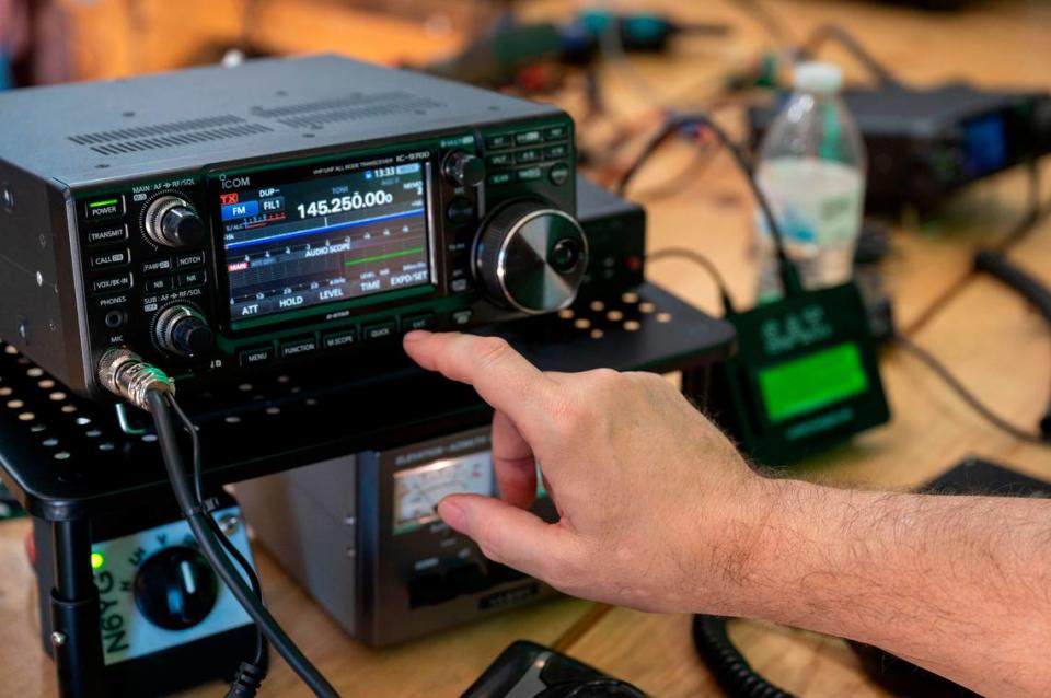 George Poulos with the River City Amateur Radio Communications Society tracks a satellite Saturday while testing out the ham radio built with a team of Girl Scouts in East Sacramento to talk with ISS astronauts next week.