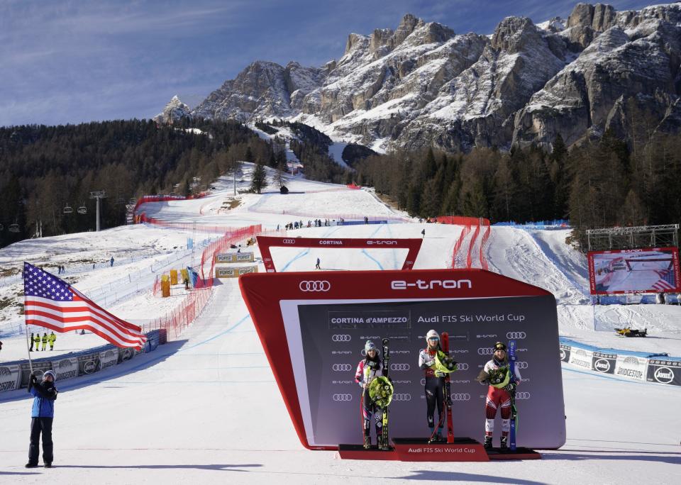 United States' Mikaela Shiffrin, center, winner of an alpine ski, women's World Cup super-G, poses on the podium with second placed Liechtenstein's Tina Weirather, left, and third placed Austria's Tamara Tippler, in Cortina D'Ampezzo, Italy, Sunday, Jan. 20, 2019. (AP Photo/Giovanni Auletta)