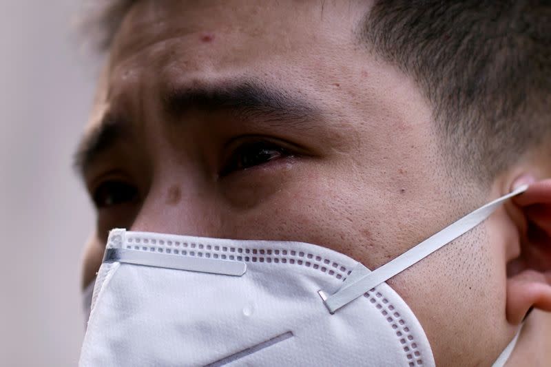 LA CHINE REND HOMMAGE AUX MILLIERS DE MORTS DE L'ÉPIDÉMIE