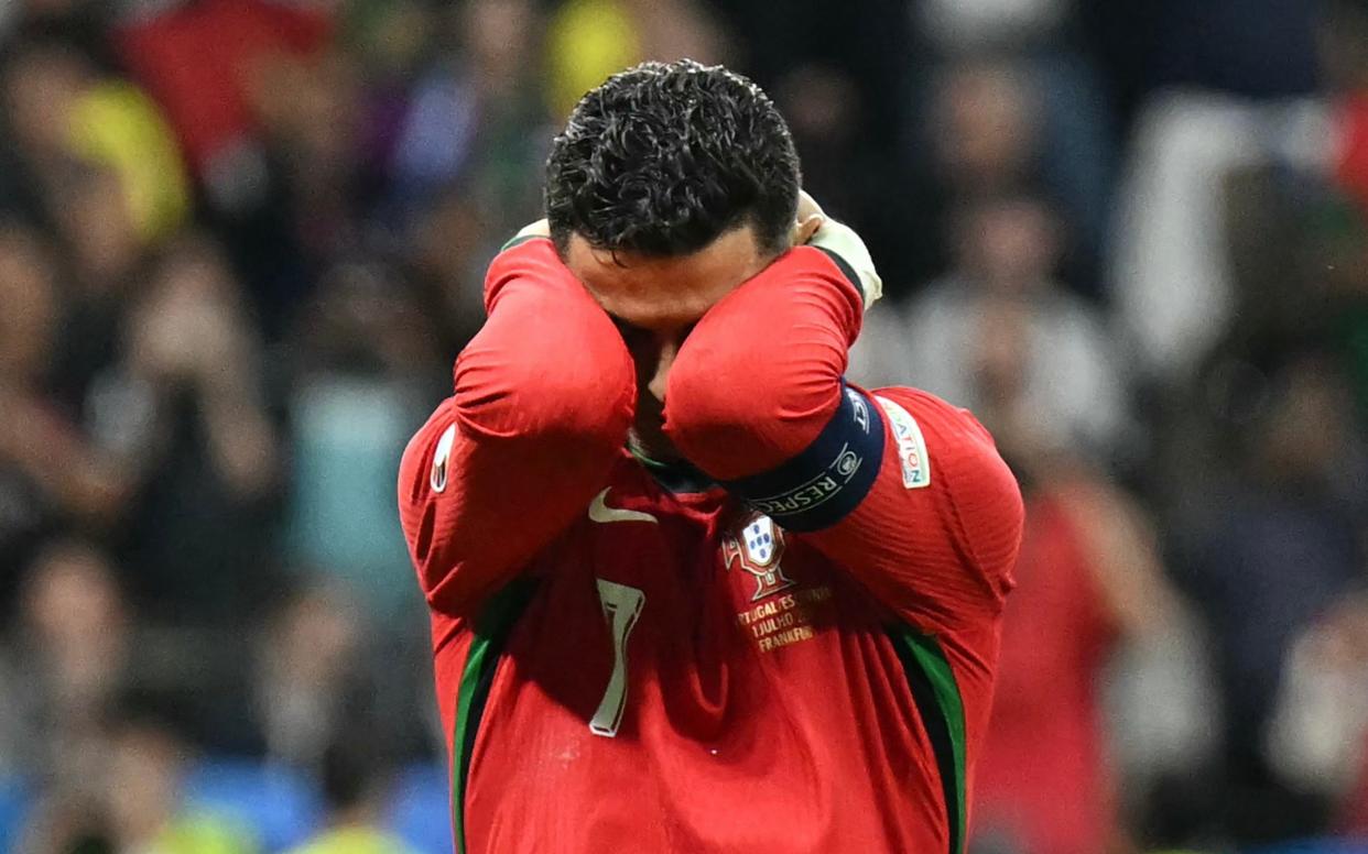 Cristiano Ronaldo reacts to missing a penalty in Portugal's Euro 2024 last-16 tie against Slovenia