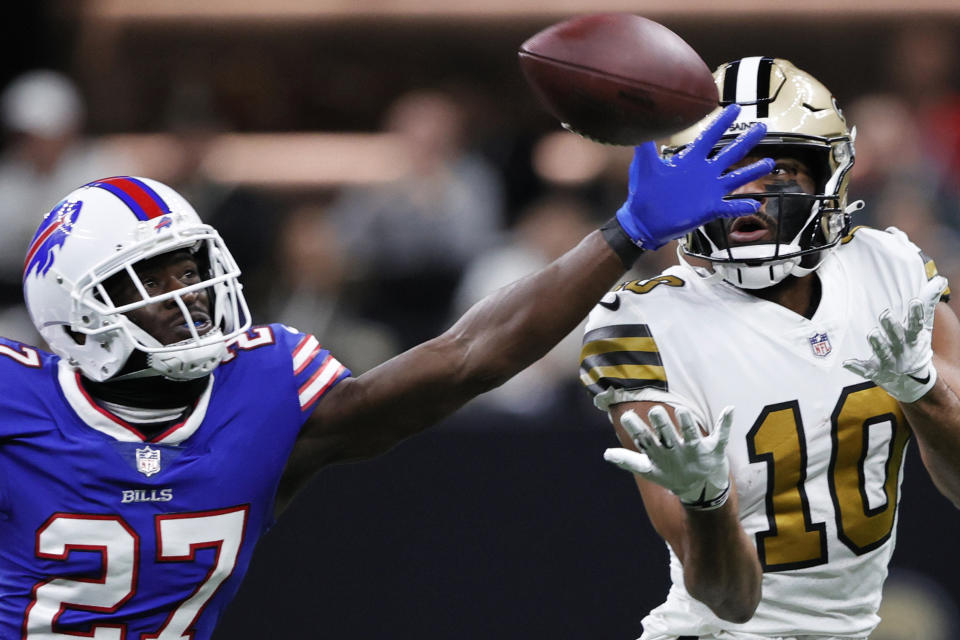 Buffalo Bills cornerback Tre'Davious White (27) defends a pass against New Orleans Saints wide receiver Tre'Quan Smith (10) in the first half of an NFL football game in New Orleans, Thursday, Nov. 25, 2021. (AP Photo/Butch Dill)