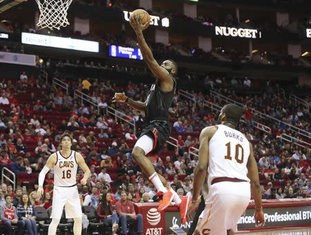 Jan 11, 2019; Houston, TX, USA; Houston Rockets guard James Harden (13) scores against the Cleveland Cavaliers in the second half at Toyota Center. Mandatory Credit: Thomas B. Shea-USA TODAY Sports