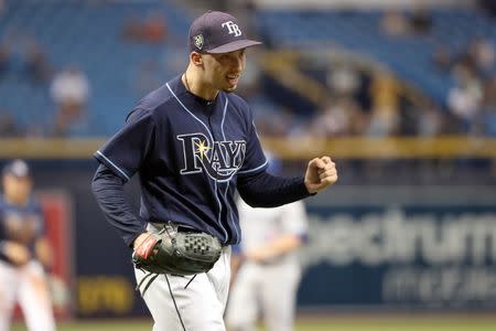 FILE PHOTO: Sep 29, 2018; St. Petersburg, FL, USA; Tampa Bay Rays starting pitcher Blake Snell (4) pumps his fist at the end of the top of the fifth inning against the Toronto Blue Jays at Tropicana Field. Mandatory Credit: Kim Klement-USA TODAY Sports/File Photo