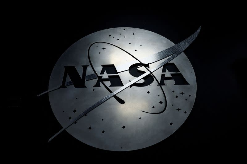 FILE PHOTO: The NASA logo hangs in the Mission Operations Control Center at Wallops Flight Facility on Wallops Island, Virginia, U.S., October 26, 2022. REUTERS/Evelyn Hockstein