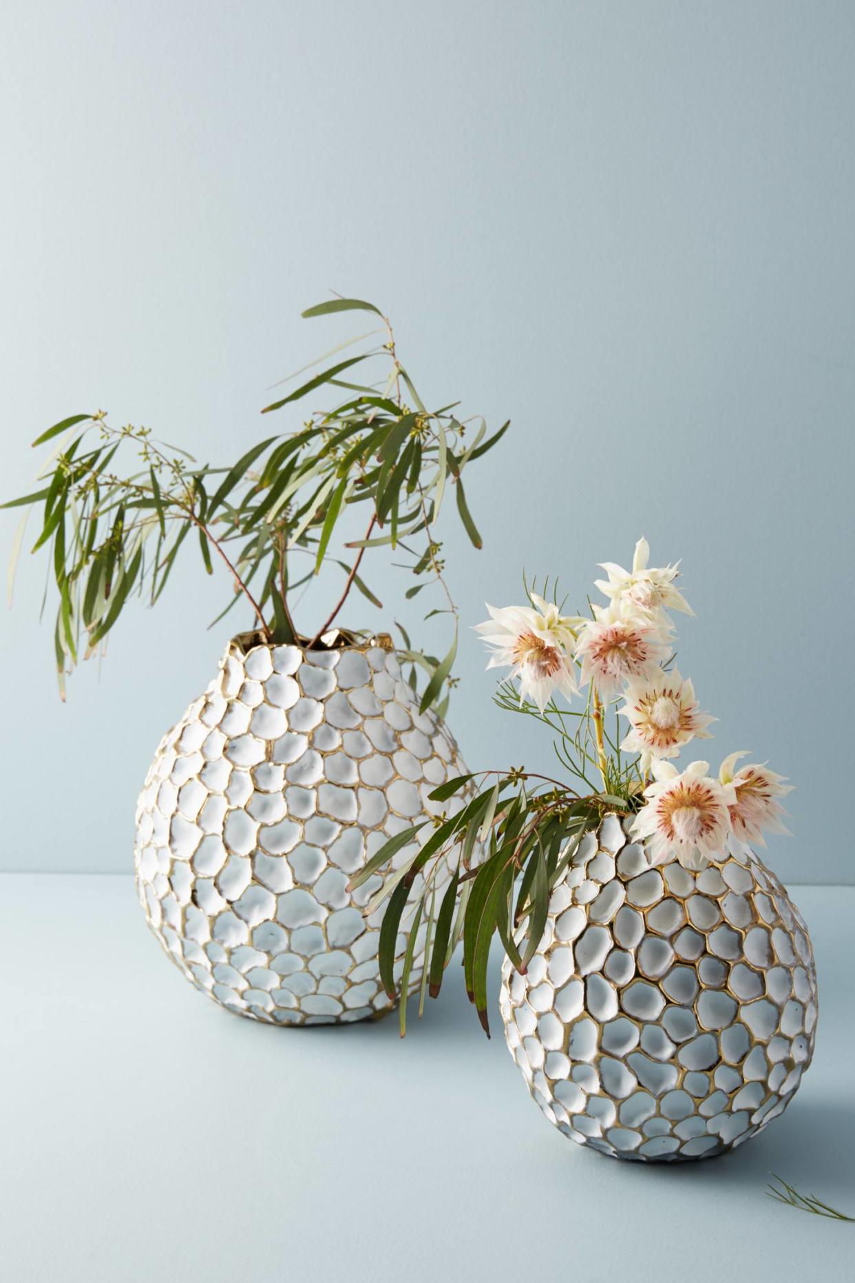 <p><a href="https://go.redirectingat.com?id=74968X1596630&url=https%3A%2F%2Fwww.anthropologie.com%2Fshop%2Fhoneycomb-vase&sref=https%3A%2F%2Fwww.womansday.com%2Flife%2Fg955%2Fcheap-gifts-for-women%2F" rel="nofollow noopener" target="_blank" data-ylk="slk:Shop Now;elm:context_link;itc:0;sec:content-canvas" class="link rapid-noclick-resp">Shop Now</a></p><p>Honeycomb Vase</p><p>anthropologie.com</p><p>$48.00</p><span class="copyright">Anthropologie</span>