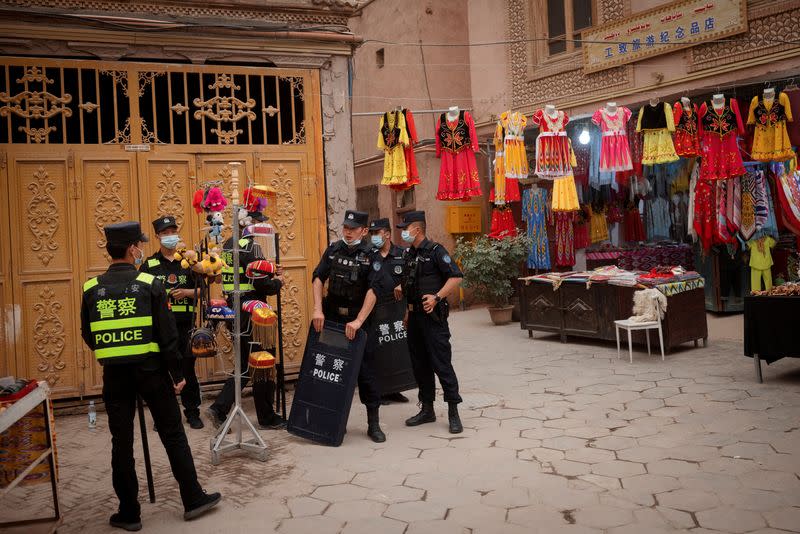 FILE PHOTO: The Wider Image: In China's new Xinjiang: patriotic tourism, police and propaganda