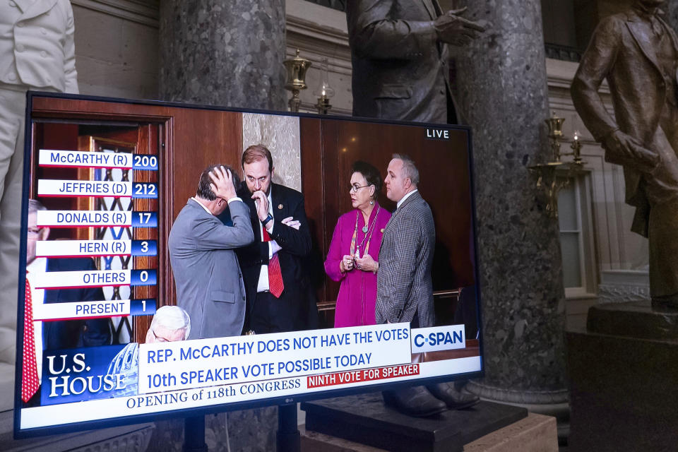 FILE - A monitor in Statuary Hall displays Republican lawmakers while they wait in the chamber as House Republican Leader Kevin McCarthy, R-Calif., struggles to become speaker of the House, at the Capitol in Washington, Jan. 5, 2023. Since the drama of Kevin McCarthy's election as House speaker, there's been some movement toward opening the chamber to more public view. His office has signaled a willingness to broaden access, although how much is still being debated. (AP Photo/J. Scott Applewhite, File)