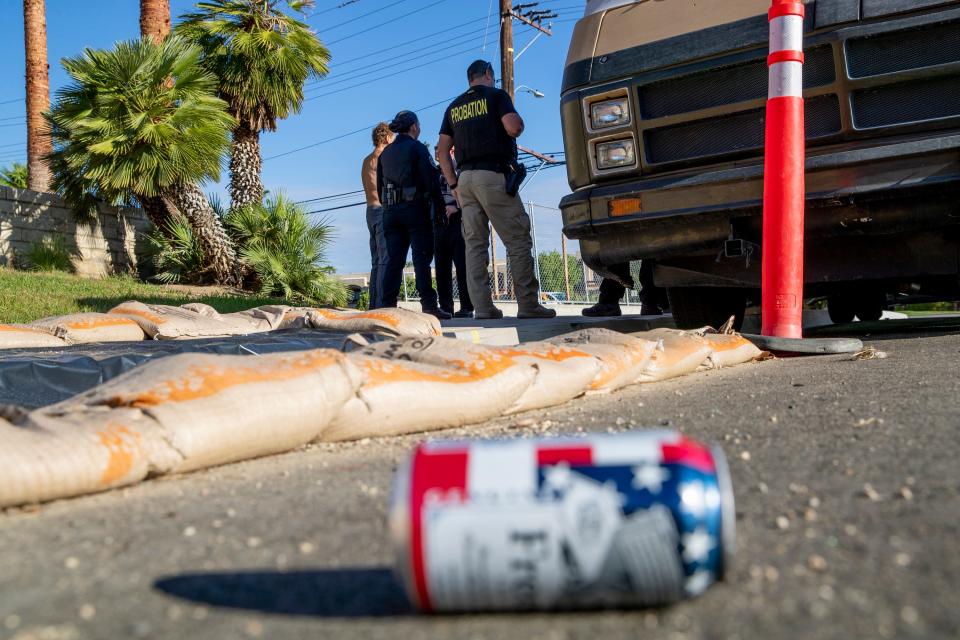 Palm Springs Police Department's Homeless Outreach and Probation teams took part in Operation Clean Streets on Palm Hills Road near East Palm Canyon Drive in Palm Springs, Calif., on Tuesday, Sept. 13, 2022. Tuesday's operation was the sixth in ongoing operations to get help for the unhoused through shelter connection, rehabilitation, or arrest. 