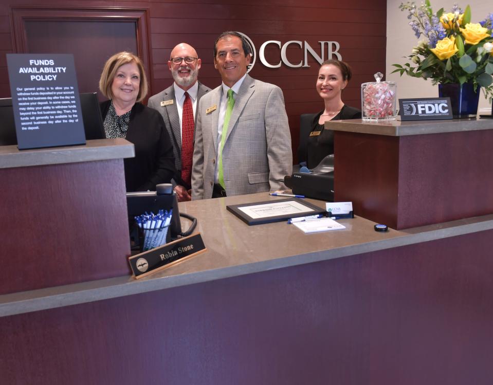 Coastal Carolina National Bank has opened a branch in downtown Spartanburg.  Here, Robin Stone, Eddie Lane, Rob Hrubala, and Dana Fox of Coastal Carolina National Bank, talk about what services the bank with bring to their Spartanburg customers.