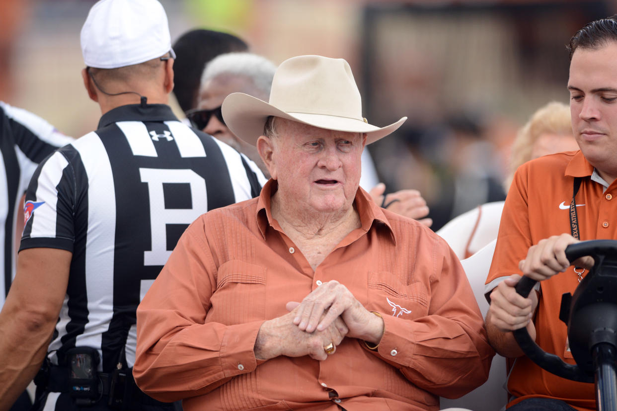 AUSTIN, TX - OCTOBER 21: Texas Longhorn alumni and donor, Red McCombs is escorted to the field for the coin toss prior to 13 - 10 loss to the Oklahoma State Cowboys on October 21, 2017 at Darrell K Royal-Texas Memorial Stadium in Austin, TX. (Photo by John Rivera/Icon Sportswire via Getty Images)