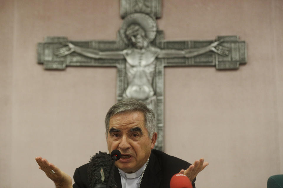 FILE - Cardinal Angelo Becciu talks to journalists during press conference in Rome, Friday, Sept. 25, 2020. The Vatican’s sprawling financial trial may not have produced any convictions yet or any new smoking guns. But recent testimony in May 2022 has provided plenty of insights into how the Vatican operates.(AP Photo/Gregorio Borgia, File)