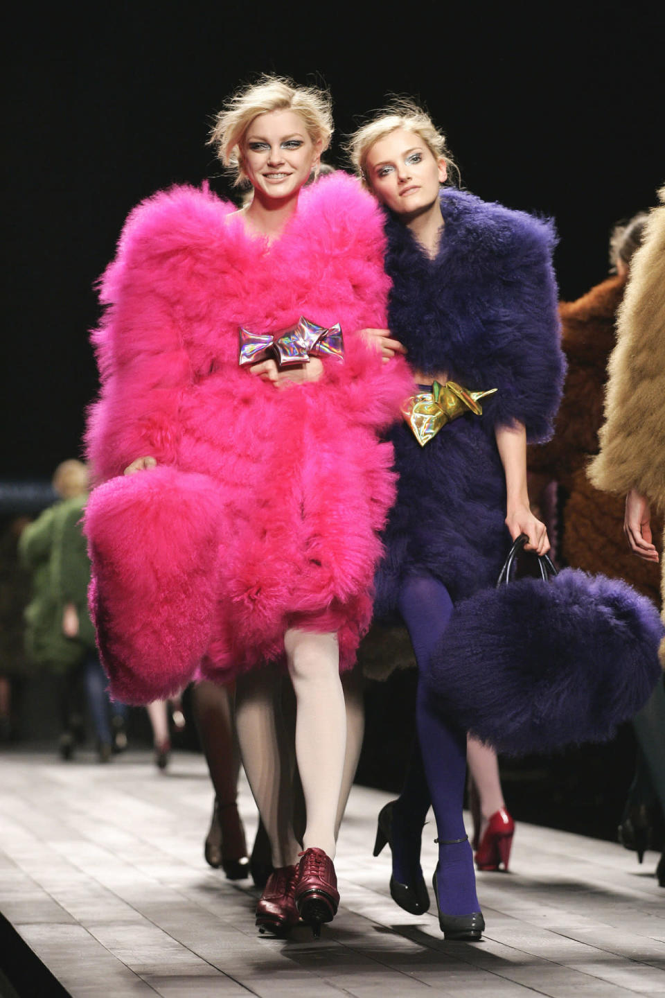 Models wear pink and purple furry coats at Sonia Rykiel’s fall 2007 show in Paris.