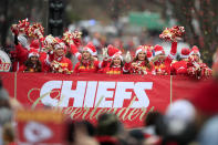 Kansas City Chiefs cheerleaders ride a float during the Super Bowl parade in Kansas City, Mo., Wednesday, Feb. 5, 2020. (AP Photo/Orlin Wagner)