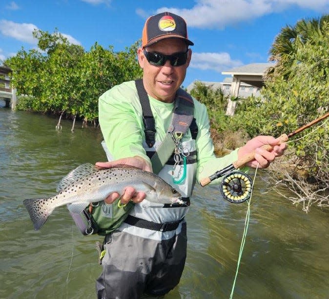 Tom Norton, visiting the area and fly-fishing with Geno Giza, caught and released this pretty seatrout this week.