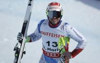 Alpine Skiing - FIS Alpine Skiing World Championships - Men's Downhill - St. Moritz, Switzerland - 12/2/17 - Beat Feuz of Switzerland reacts at the finish line. REUTERS/Denis Balibouse