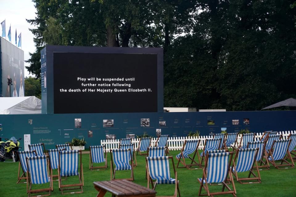 A screen displays a message that play has been suspended following the announcement of the death of Queen Elizabeth II, during day one of the BMW PGA Championship at Wentworth (Adam Davy/PA) (PA Wire)
