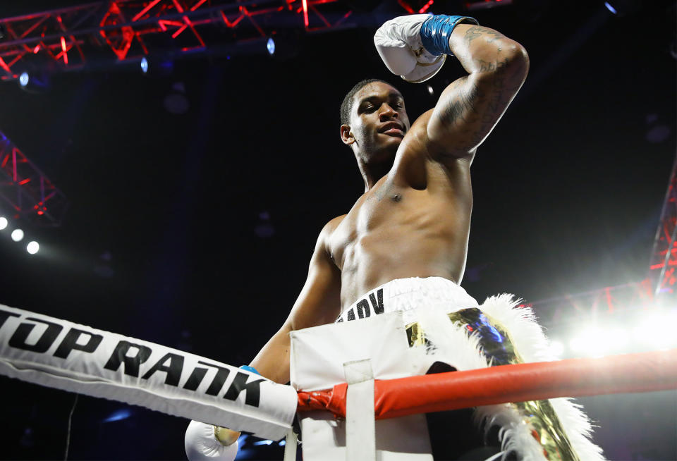 Jared Anderson celebrates his win over Andrew Satterfield (not pictured) on Jan. 18 in Verona, New York. (Mikey Williams/Top Rank)