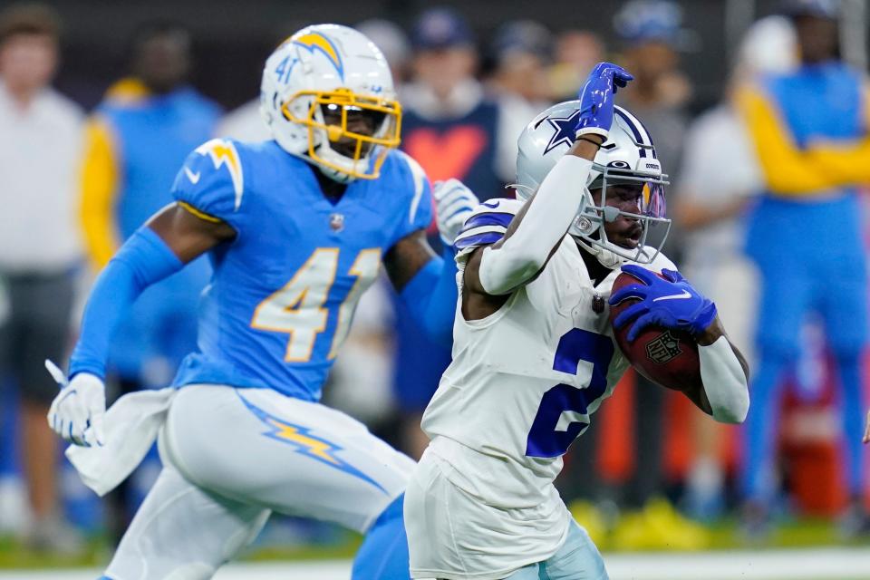 Cowboys WR KaVontae Turpin take a kickoff back for a TD against the Chargers on Saturday night.