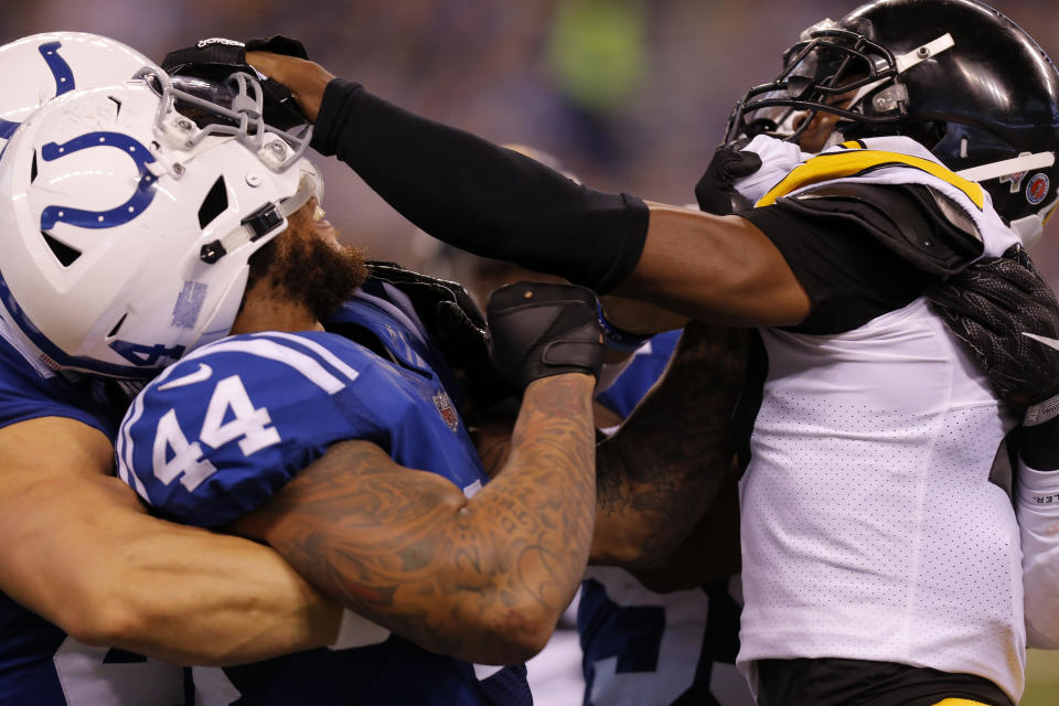 <p>Pittsburgh Steelers corner back Artie Burns (25) rips the helmet of Indianapolis Colts inside linebacker Antonio Morrison (44) during a scuffle after the punt during an NFL football game between the Pittsburg Steelers and the Indianapolis Colts on November 12, 2017, at Lucas Oil Stadium in Indianapolis IN. (Photo by Jeffrey Brown/Icon Sportswire) </p>