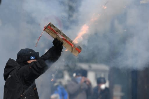 Police said 109 people were taken into custody after hooded youths ran amok at May Day protests in Paris