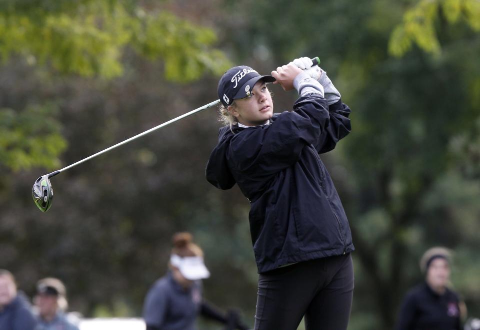 Canton Central Catholic Kristen Belden tees off on hole 10 of the Ohio State University Gray Course during the Division II Girls State Golf Tournament on Saturday October 16, 2021.
