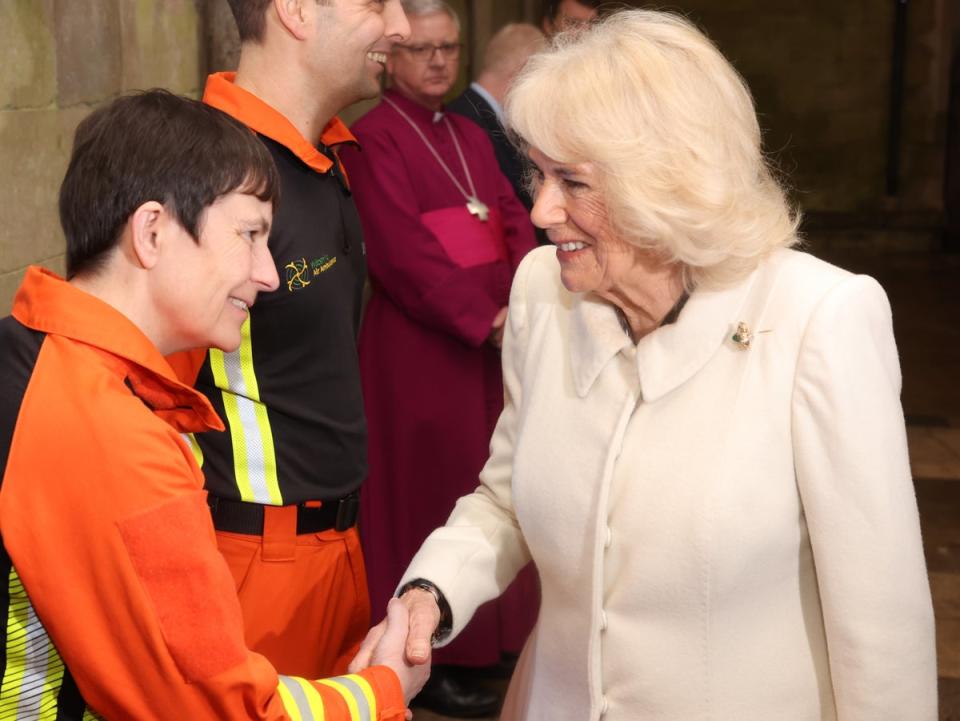 Queen Camilla is greeted by air ambulance charity representatives (Chris Jackson/PA Wire)