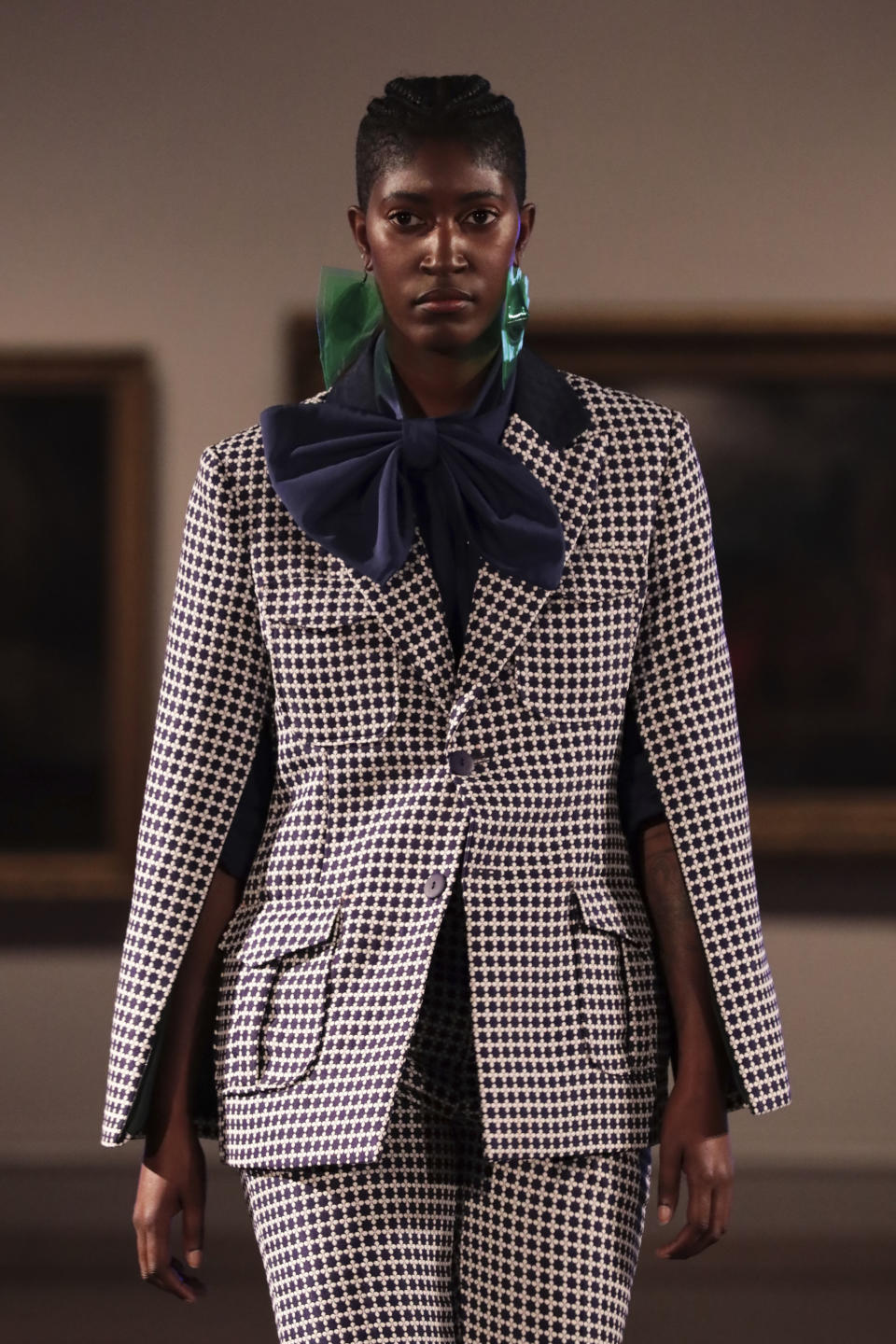 The Devonation by Devon Yan collection is modeled during the dapperQ fashion show at the Brooklyn Museum on Thursday, Sept. 5, 2019, in New York. (AP Photo/Jeenah Moon)