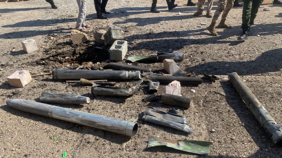 Shell casings lie at the site of a US airstrike in Al Qaim, Iraq, February 3, 2024. - Stringer/Reuters