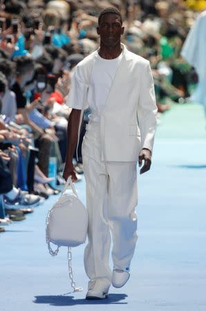 A model presents a creation by designer Virgil Abloh as part of his Spring/Summer 2019 collection for Louis Vuitton fashion house during Men's Fashion Week in Paris, France, June 21, 2018. REUTERS/Charles Platiau