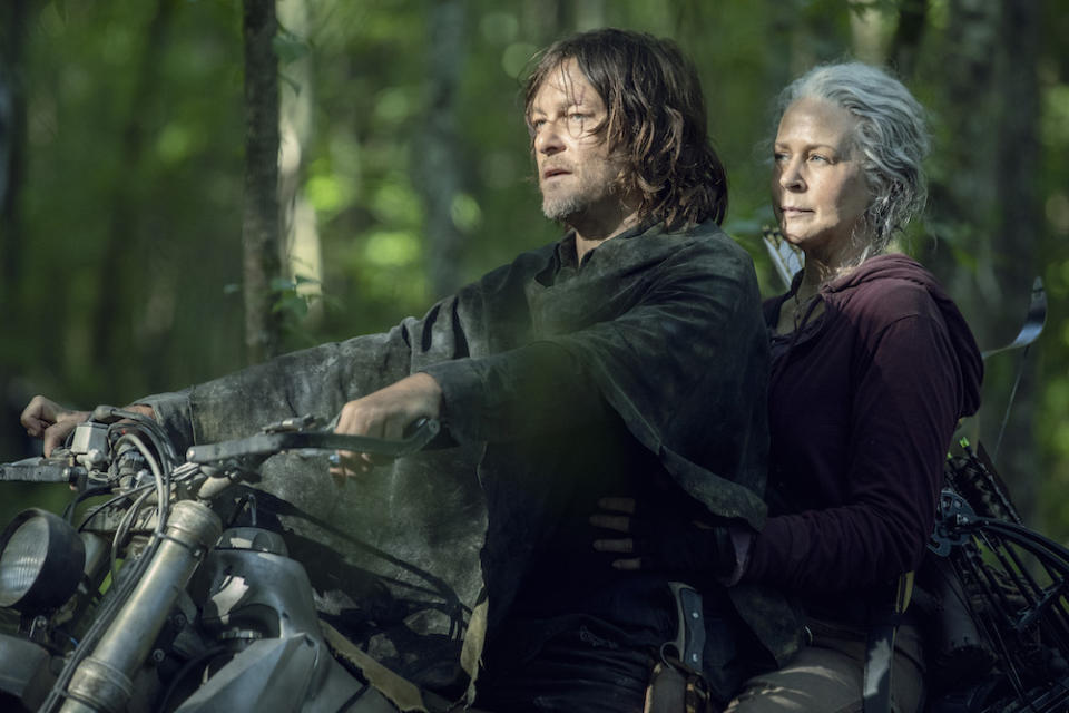 Norman Reedus as Daryl Dixon, Melissa McBride as Carol Peletier in The Walking Dead