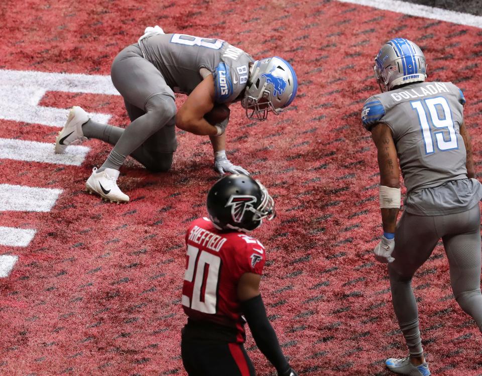 Falcons cornerback Kendall Sheffield reacts as Detroit Lions tight end T.J. Hockenson, left, makes the game-winning touchdown catch to beat the Falcons 23-22 with the extra point as time expires in an NFL football game on Sunday, Oct 25, 2020, in Atlanta. (Curtis Compton/Atlanta Journal-Constitution via AP)