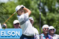 K.H. Lee, of South Korea, tees off on the second hole during the first round of the AT&T Byron Nelson golf tournament in McKinney, Texas, on Thursday, May 12, 2022. (AP Photo/Emil Lippe)