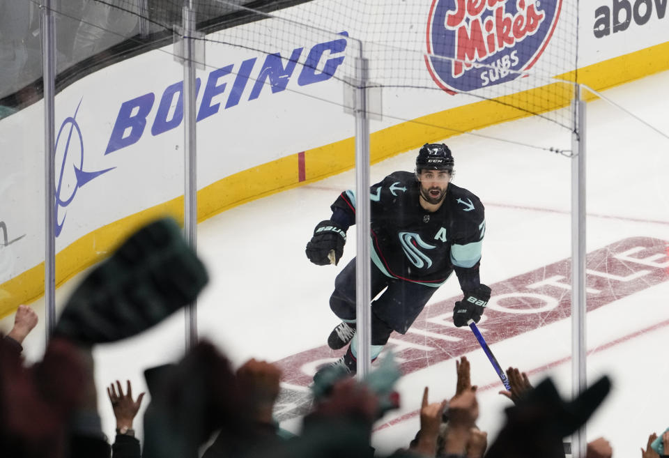 Seattle Kraken right wing Jordan Eberle (7) celebrates scoring to win the game against the Colorado Avalanche in overtime in Game 4 of an NHL hockey Stanley Cup first-round playoff series Monday, April 24, 2023, in Seattle. The Kraken won 3-2 in overtime. (AP Photo/Lindsey Wasson)