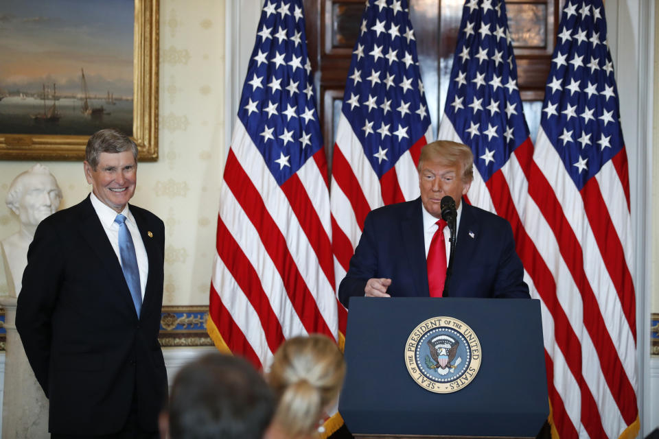 President Donald Trump speaks during an event to present the Presidential Medal of Freedom to Jim Ryun, left, in the Blue Room of the White House, Friday, July 24, 2020, in Washington. (AP Photo/Alex Brandon)