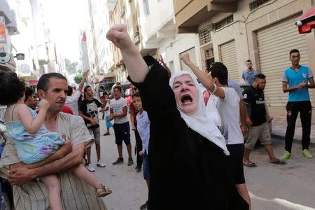 A women shouts slogan during a demonstration against official abuses and corruption in the town of Al-Hoceima, Morocco July 20, 2017. REUTERS/Youssef Boudlal