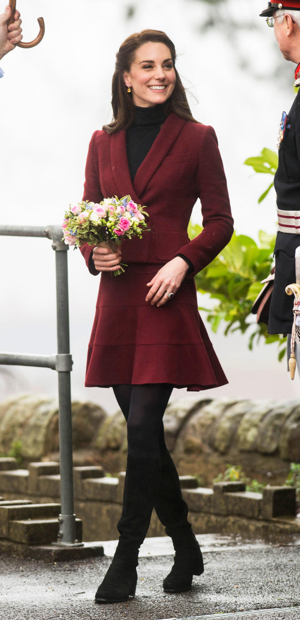 In A Paule Ka Skirt Suit and Stuart Weitzman Boots