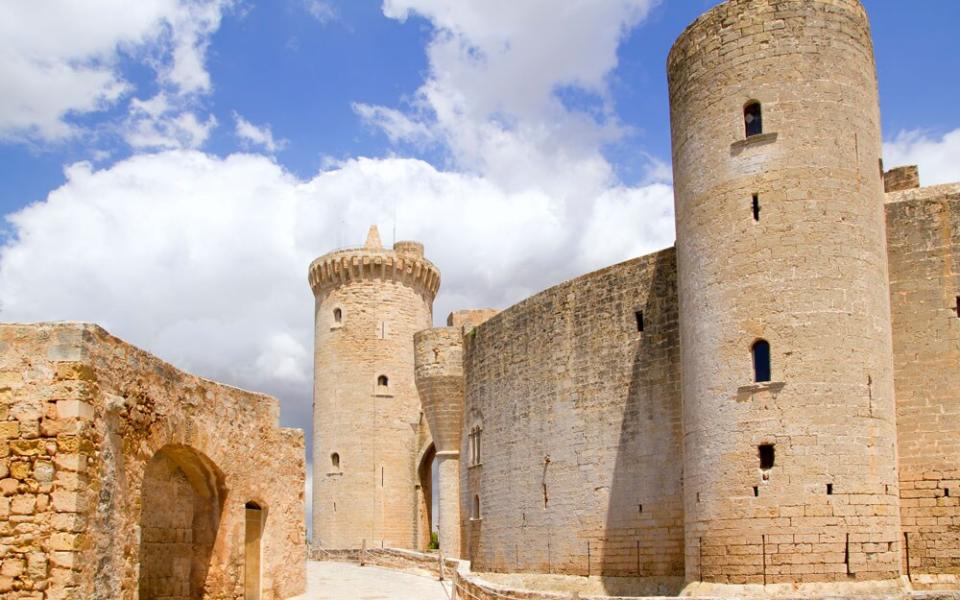 The perfectly preserved Bellver Castle crowns a wooded hill just outside the city in Palma