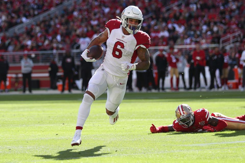 Arizona Cardinals running back James Conner (6) runs for a touchdown against the San Francisco 49ers during the first half of an NFL football game in Santa Clara, Calif., Sunday, Nov. 7, 2021.